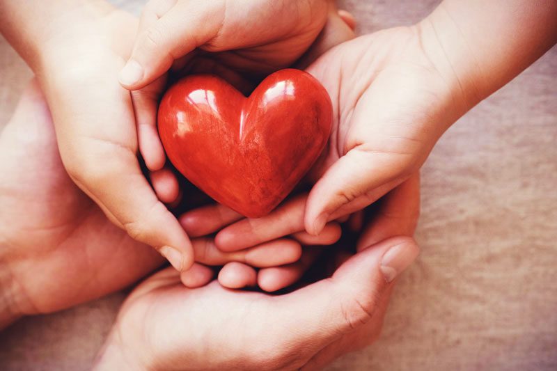 set of 3 hands holding heart - addiction treatment centers wichita kansas